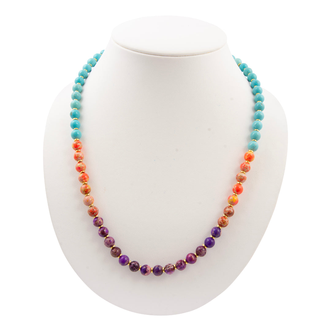 Multicolored beaded necklace on a white mannequin bust