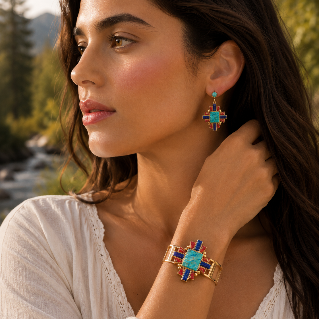 Woman wearing a gold bracelet with a colorful design outdoors