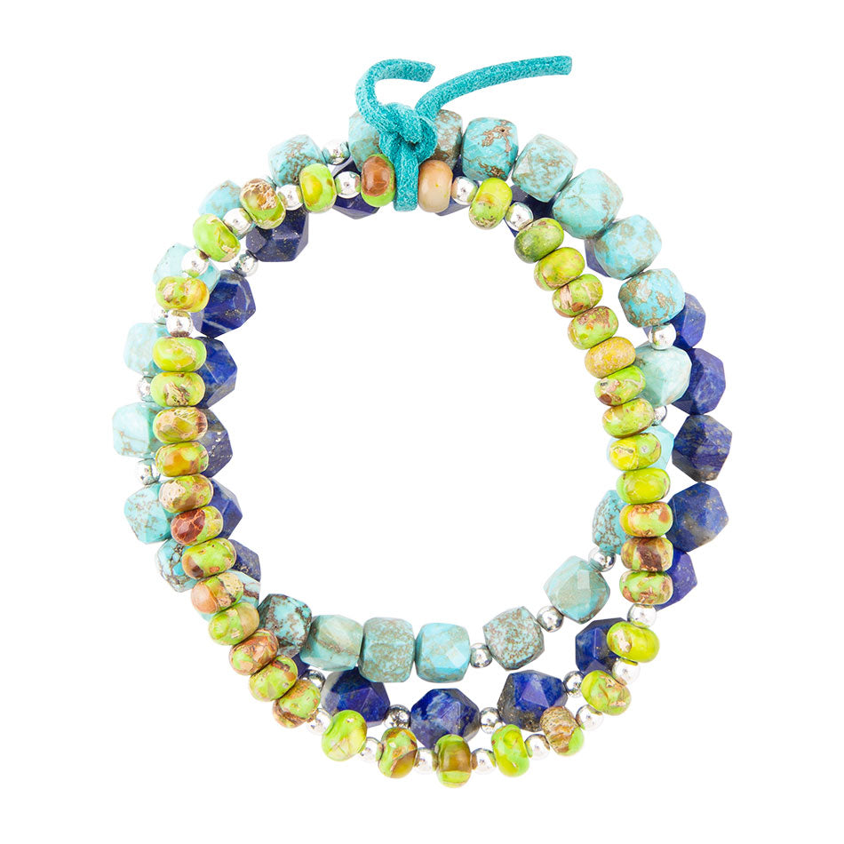 A multi-strand beaded bracelet featuring turquoise, lapis lazuli, and olive green beads with small silver spacer beads, tied with a turquoise cord at the top, shown on a plain white background.