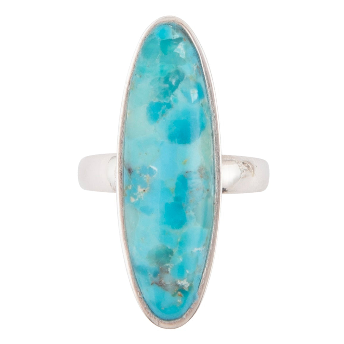 Turquoise stone ring with silver band on a white background
