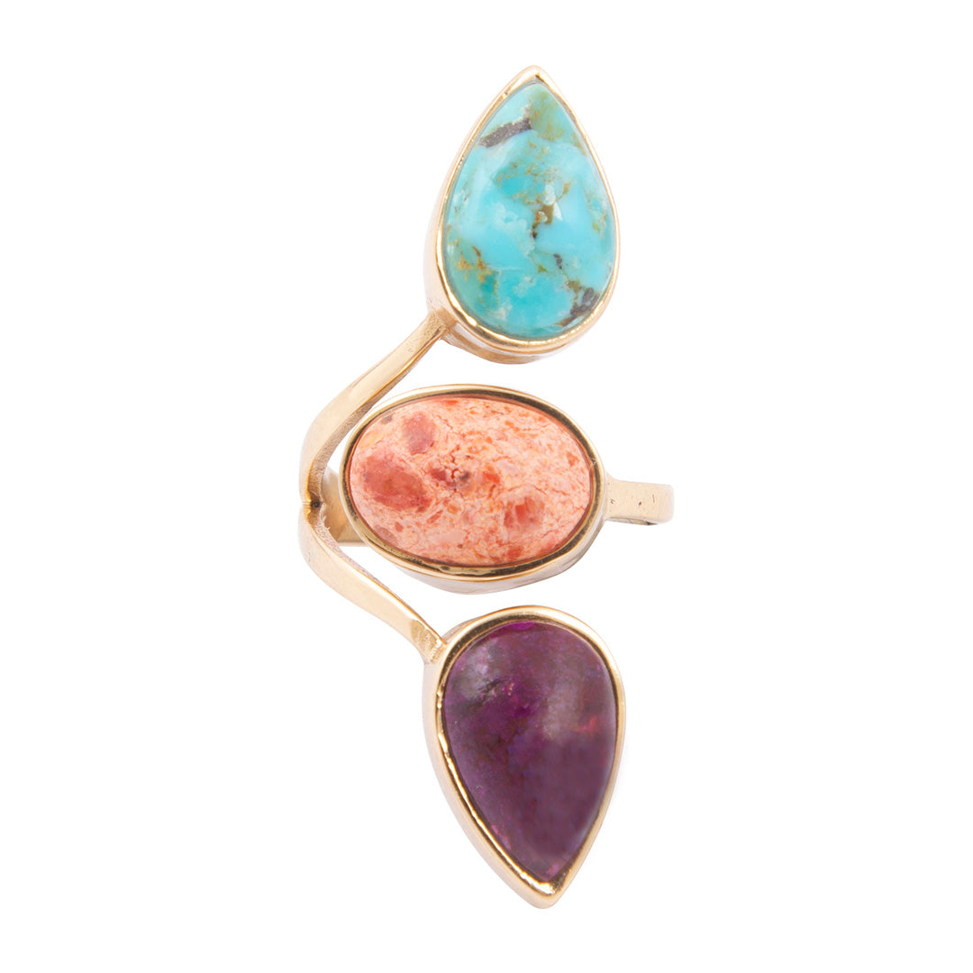 Jewelry set with gold frame and colorful gemstones on a white background