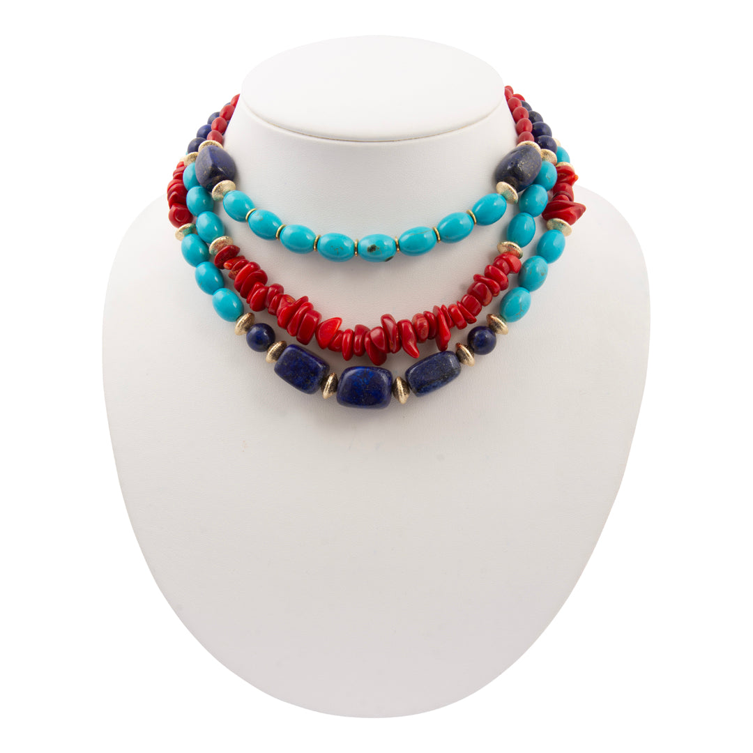 Colorful beaded necklace on a white mannequin bust