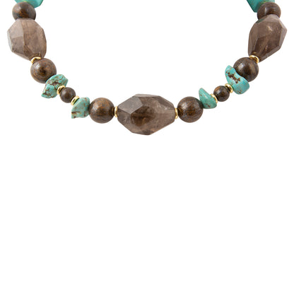 Close-up of Barse Earthbound smoky quartz, magnesite, yellow jasper and bronzite necklace beads