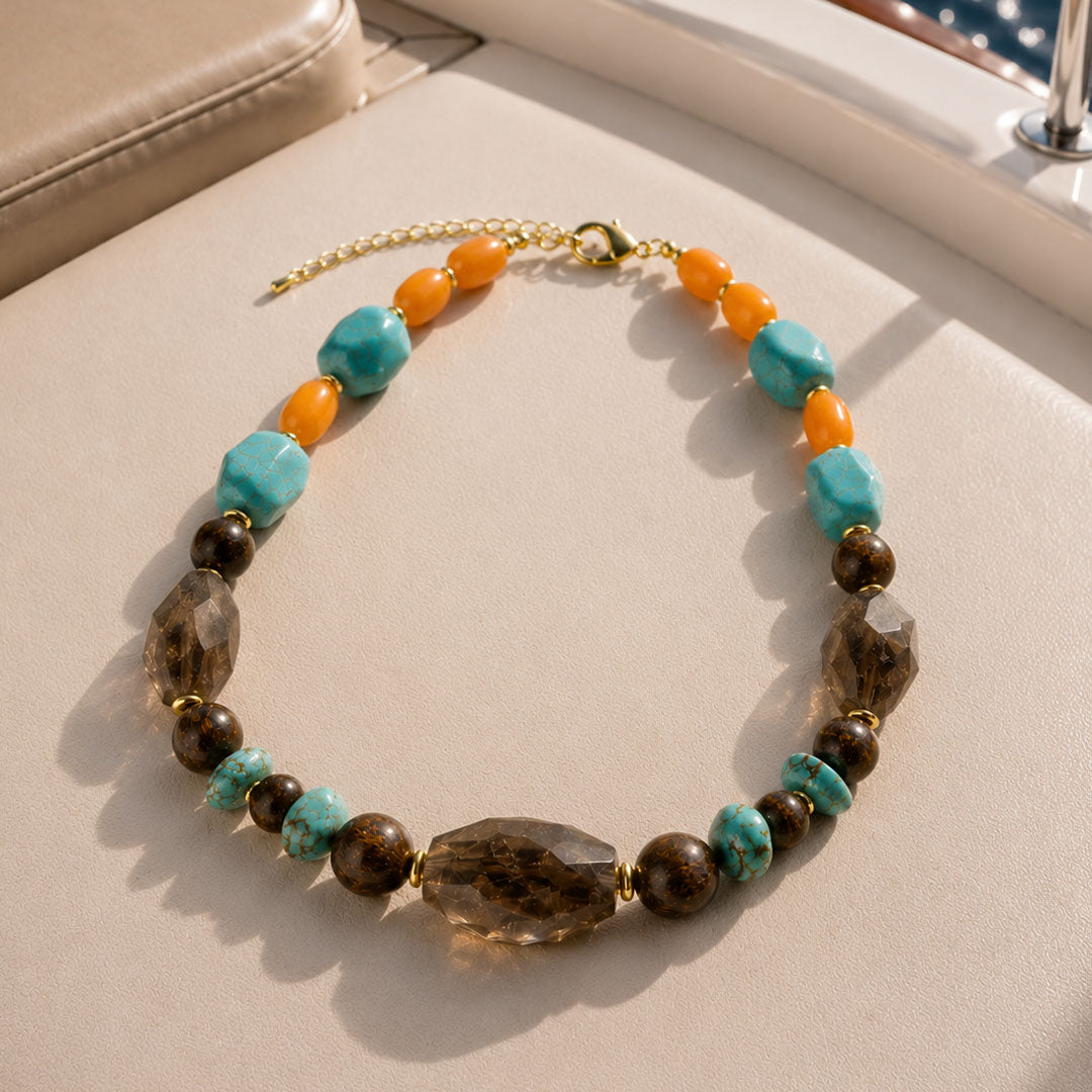 Barse Earthbound smoky quartz mixed-stone statement necklace on a styled background