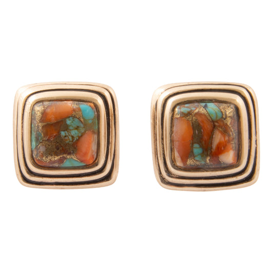 A pair of square stud earrings with concentric triple-band gold-toned borders and a central inlay featuring orange-brown and turquoise marbled stone.