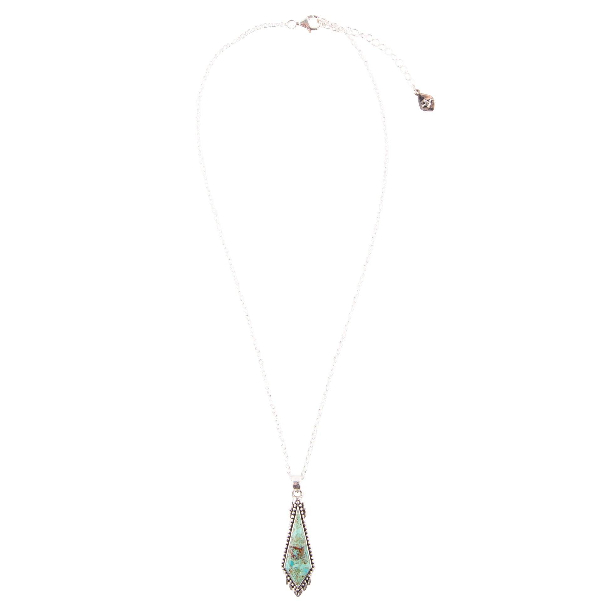 Necklace with a green pendant on a white background