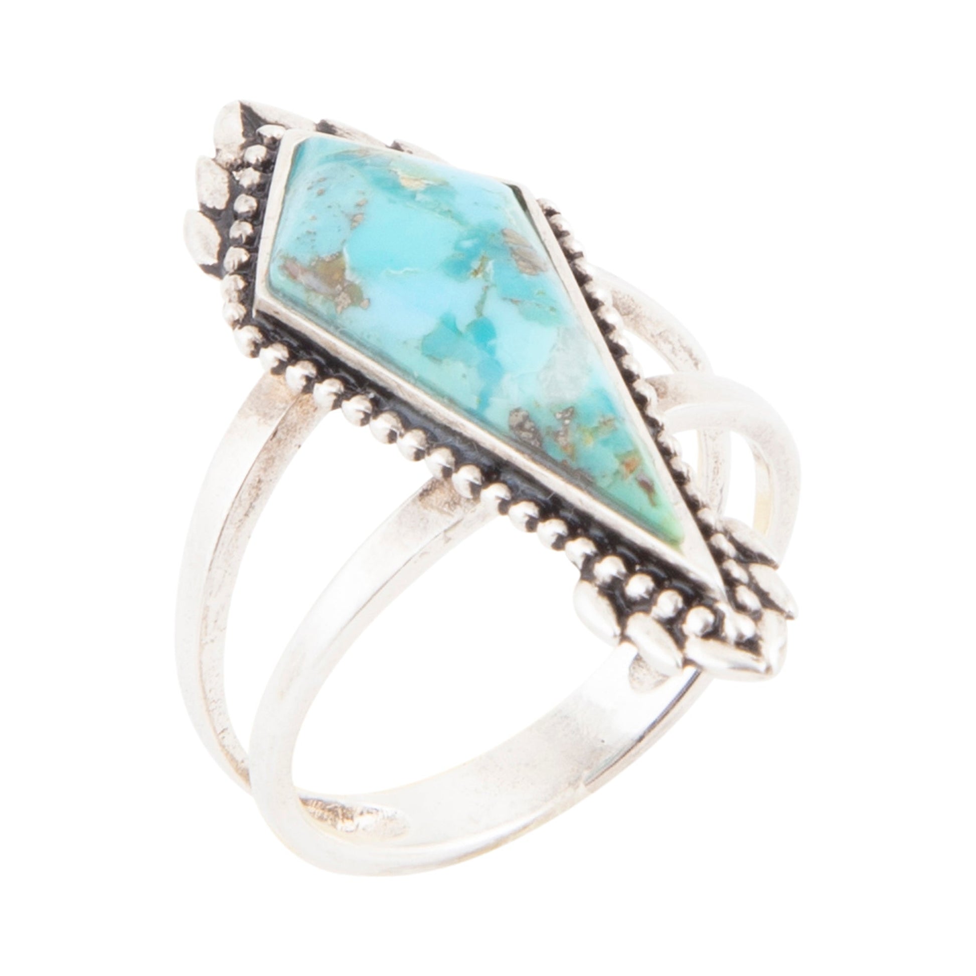 Silver ring with turquoise stone on a white background