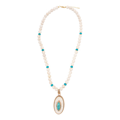 Necklace with white beads and a turquoise pendant on a white background