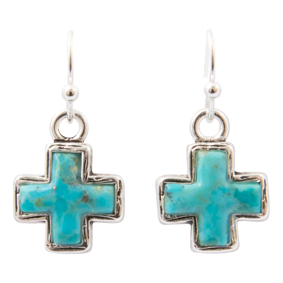A pair of silver cross dangle earrings with turquoise inlay, shown against a plain white background.