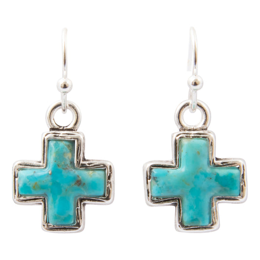 A pair of silver cross dangle earrings with turquoise inlay, shown against a plain white background.