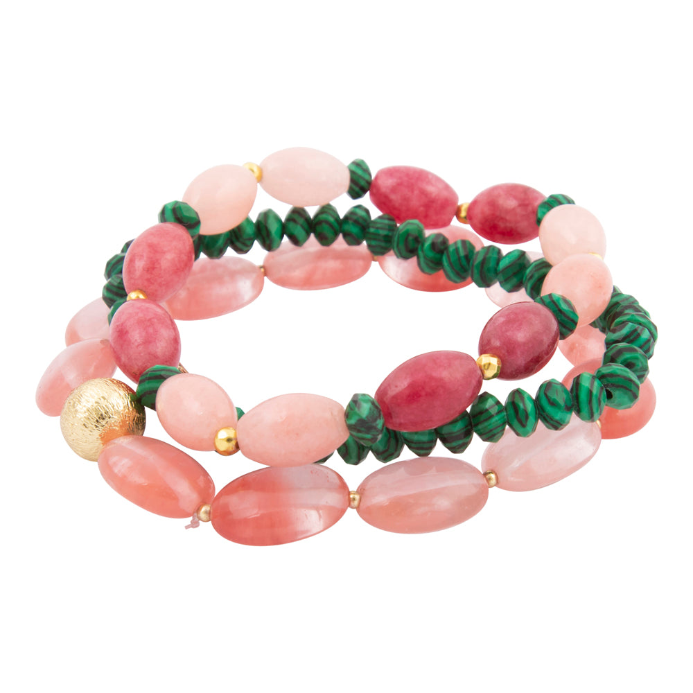 Set of three beaded bracelets with pink, green, and gold beads on a white background