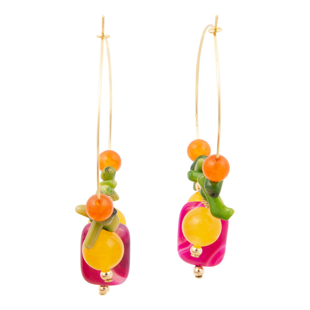 Colorful beaded earrings on a white background