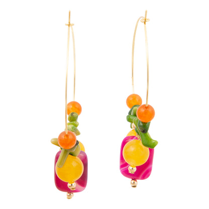 Colorful beaded earrings on a white background