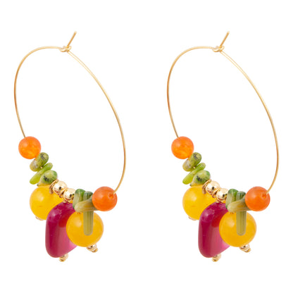 Colorful beaded hoop earrings on a white background