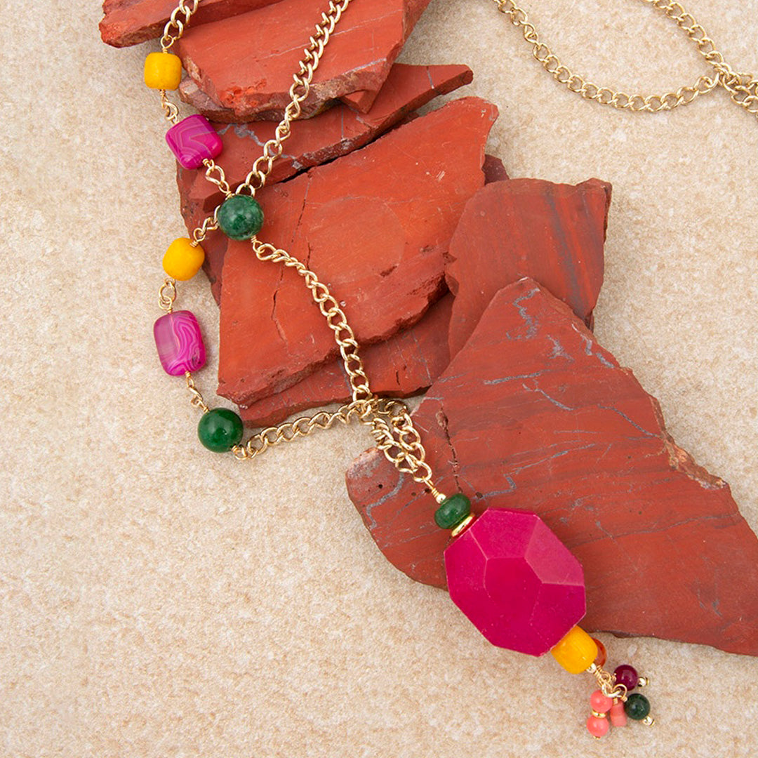 Necklace with colorful beads on a textured surface