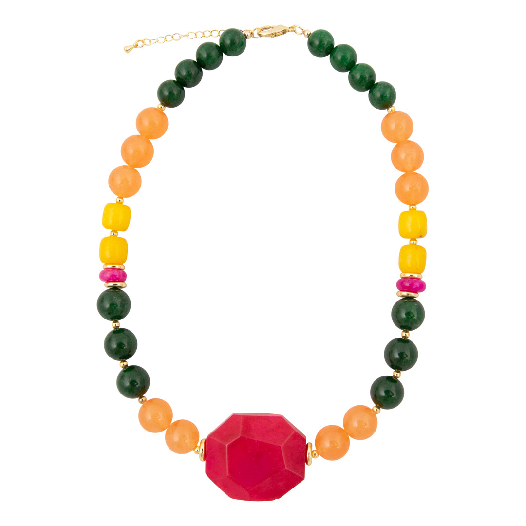 Colorful beaded necklace with a pink hexagonal pendant on a white background