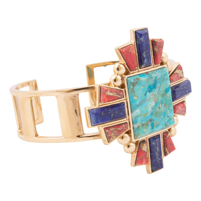 Multicolored gemstone bracelet with gold accents on a white background