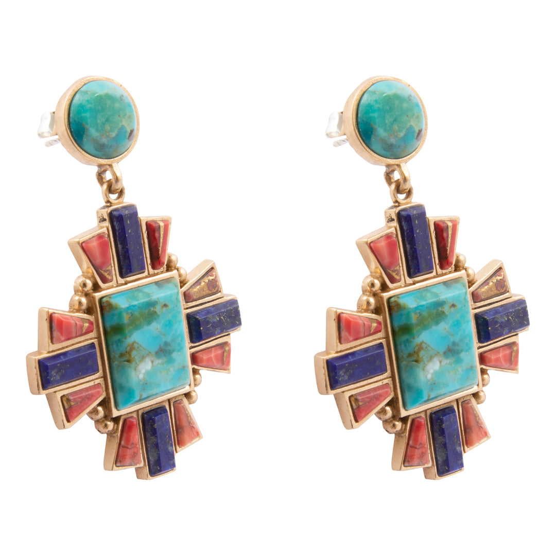 Colorful geometric earrings with turquoise and red stones on a white background
