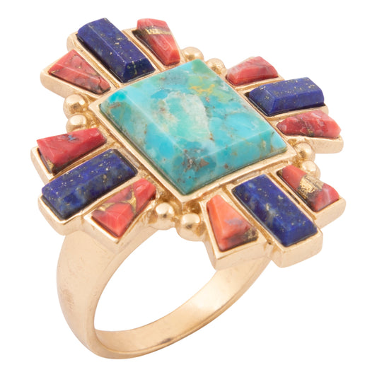 Multicolored gemstone ring with gold band on a white background