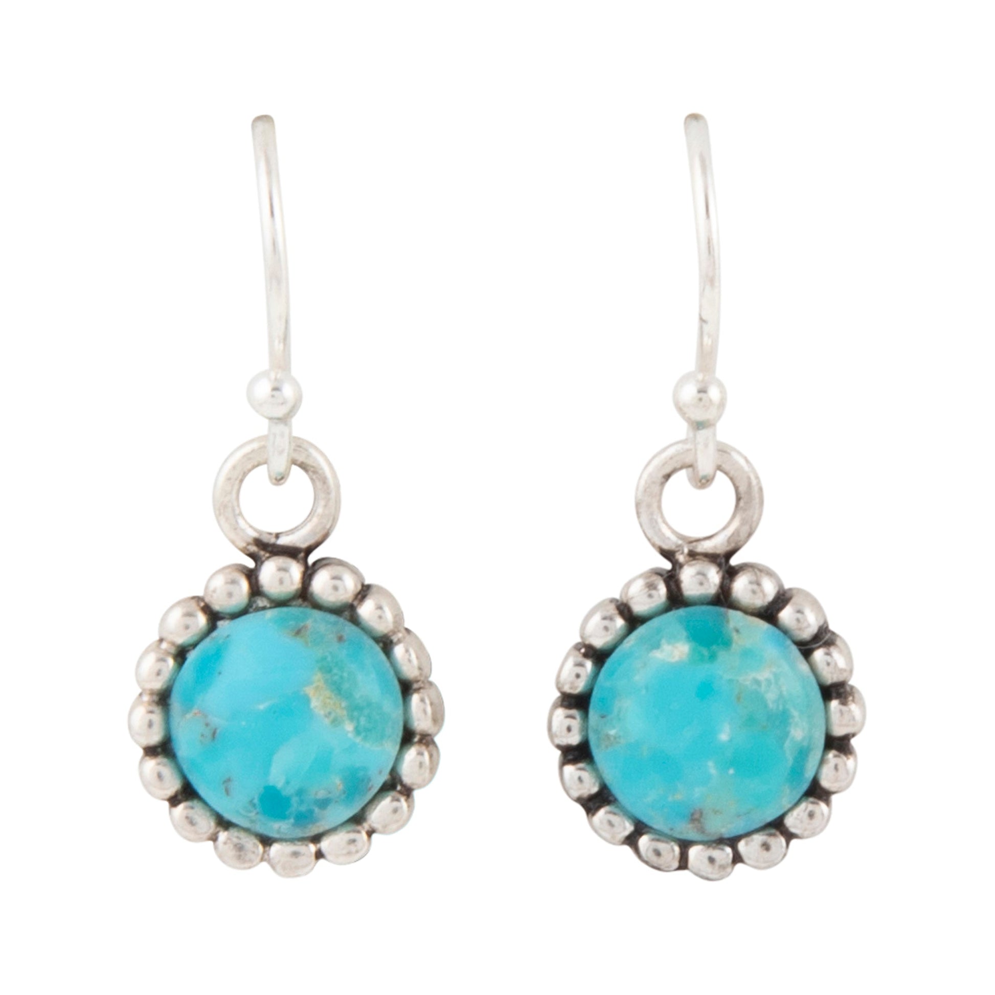 Turquoise stone earrings with silver detailing on a white background