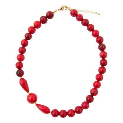 A red beaded necklace with a mix of smooth round beads, faceted teardrop beads, and a dark red polished accent bead, finished with gold-tone hardware.