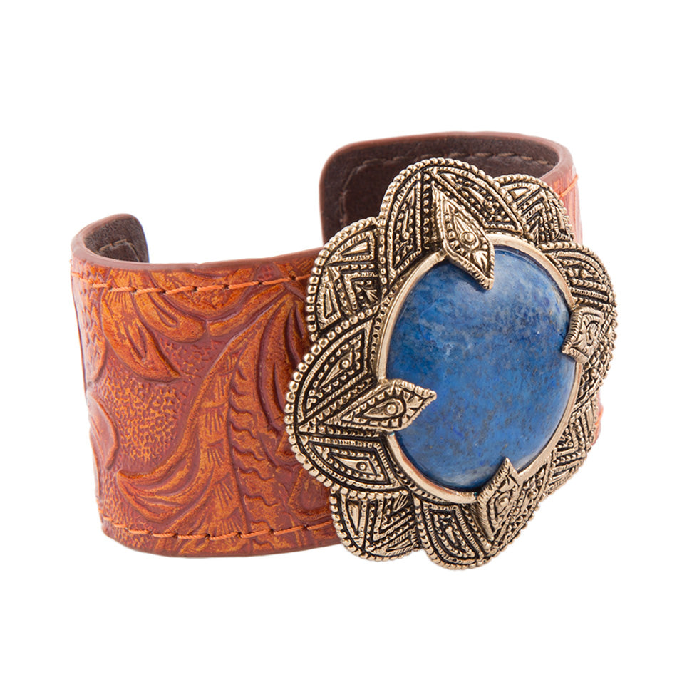 Blue lapis leather cuff bracelet with an ornate bronze floral bezel.