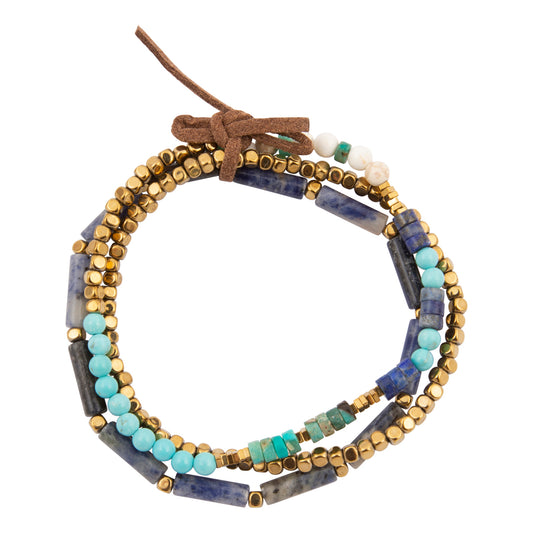 Multistrand beaded bracelet with blue, gold, and turquoise beads on a white background
