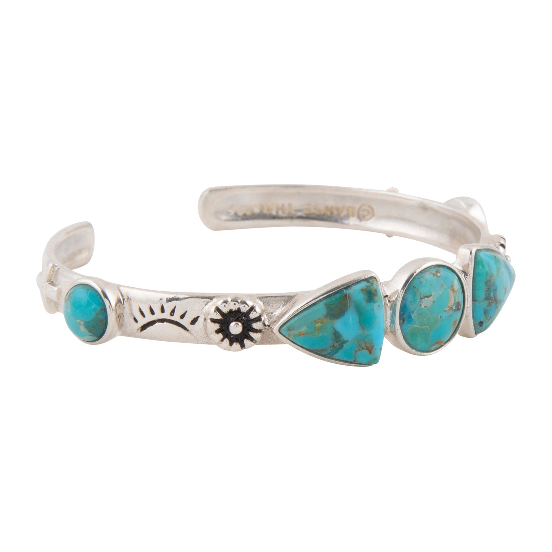 Silver bracelet with turquoise stones on a white background