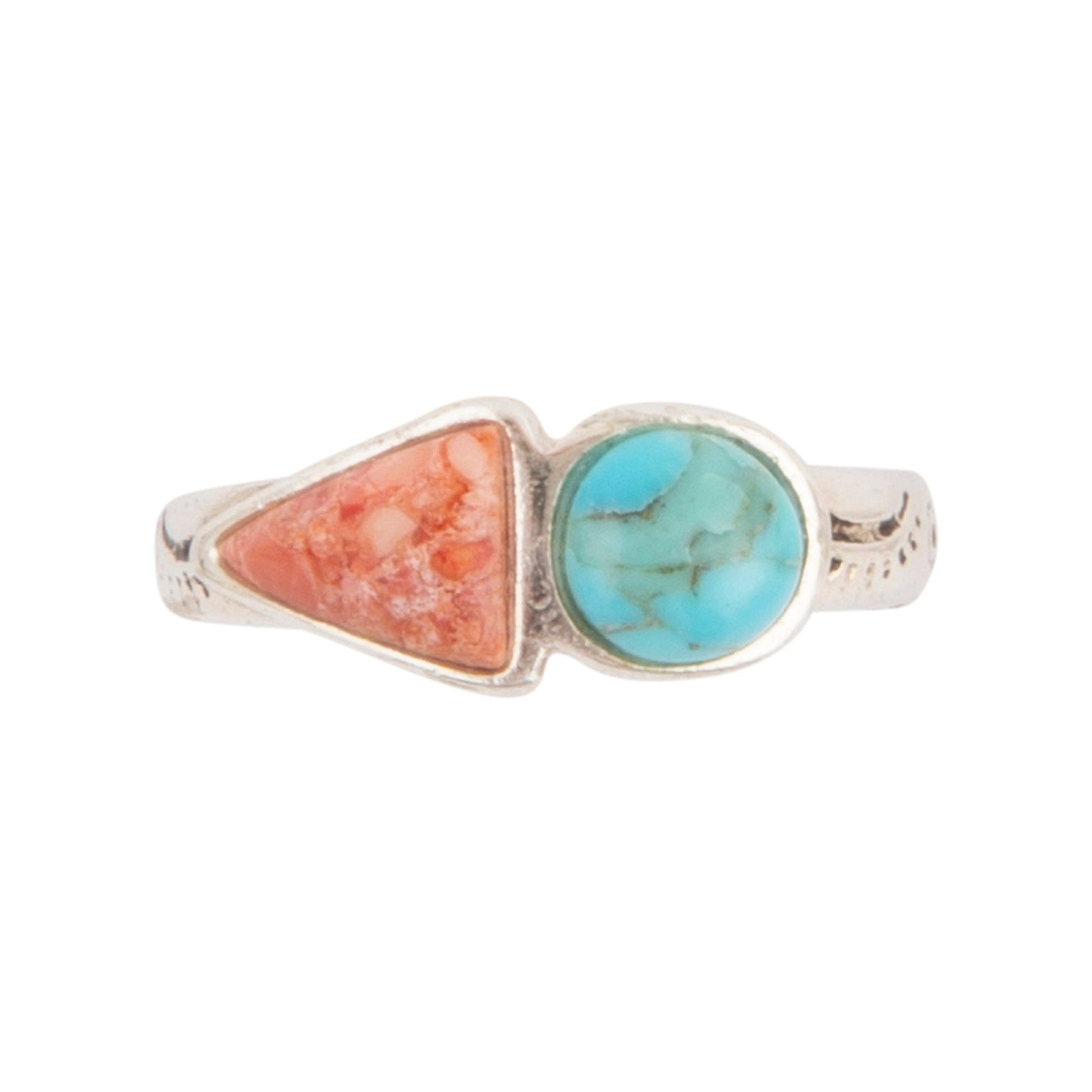 Silver ring with turquoise and coral stones on a white background