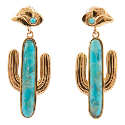 Cactus-shaped earrings with gold accents and turquoise stones on a white background