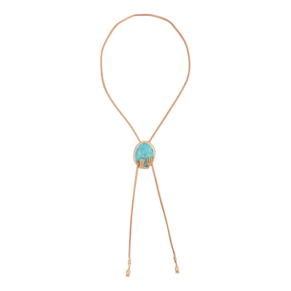 Necklace with a turquoise pendant on a white background