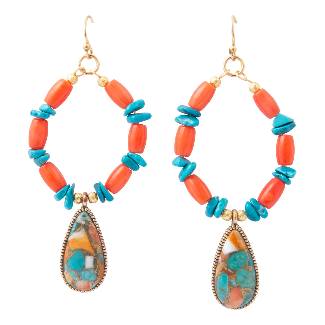 A pair of bohemian dangle earrings featuring coral and turquoise beads with teardrop-shaped turquoise stone pendants, shown on a solid white background.