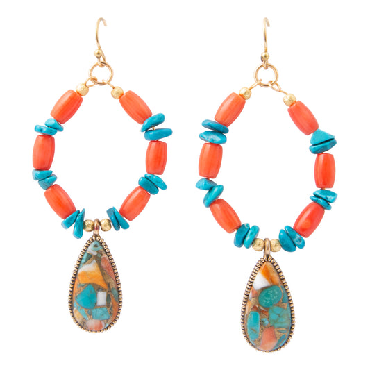 A pair of bohemian dangle earrings featuring coral and turquoise beads with teardrop-shaped turquoise stone pendants, shown on a solid white background.