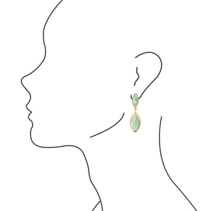 Earring worn by a silhouette of a person on a white background