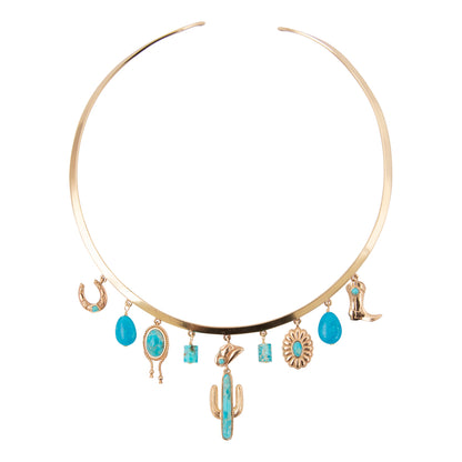 Gold necklace with turquoise charms on a white background