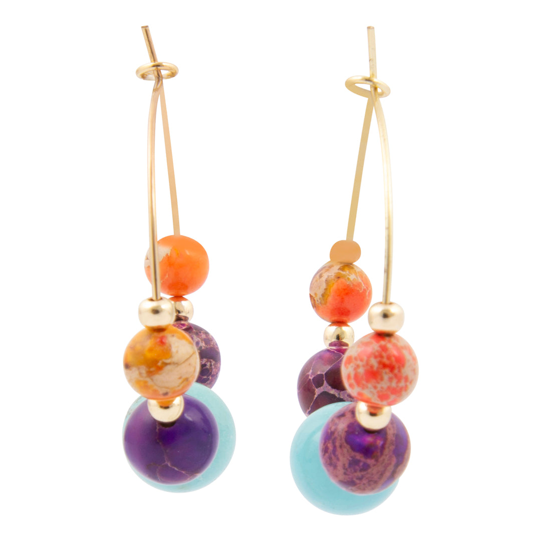 Multicolored beaded earrings on a white background