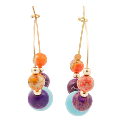 Multicolored beaded earrings on a white background