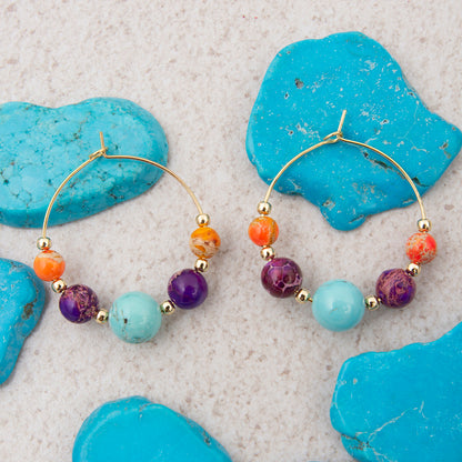 Colorful beaded earrings on turquoise stones
