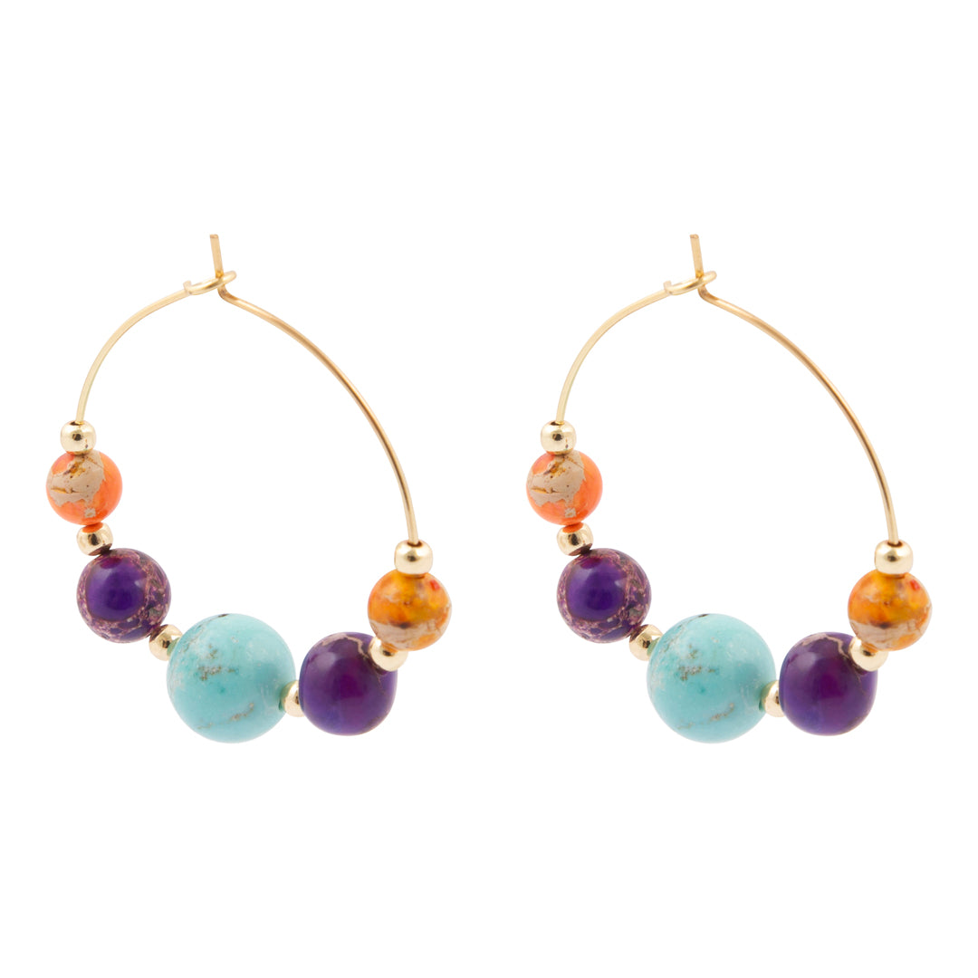 Hoop earrings with multicolored beads on a white background
