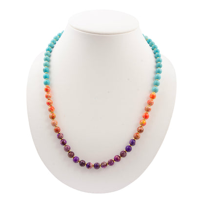 Multicolored beaded necklace on a white mannequin bust