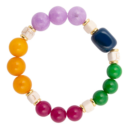 Multicolored beaded bracelet with gold accents on a white background