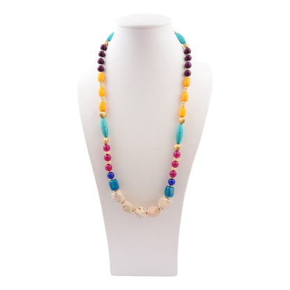 Colorful beaded necklace on a white mannequin bust