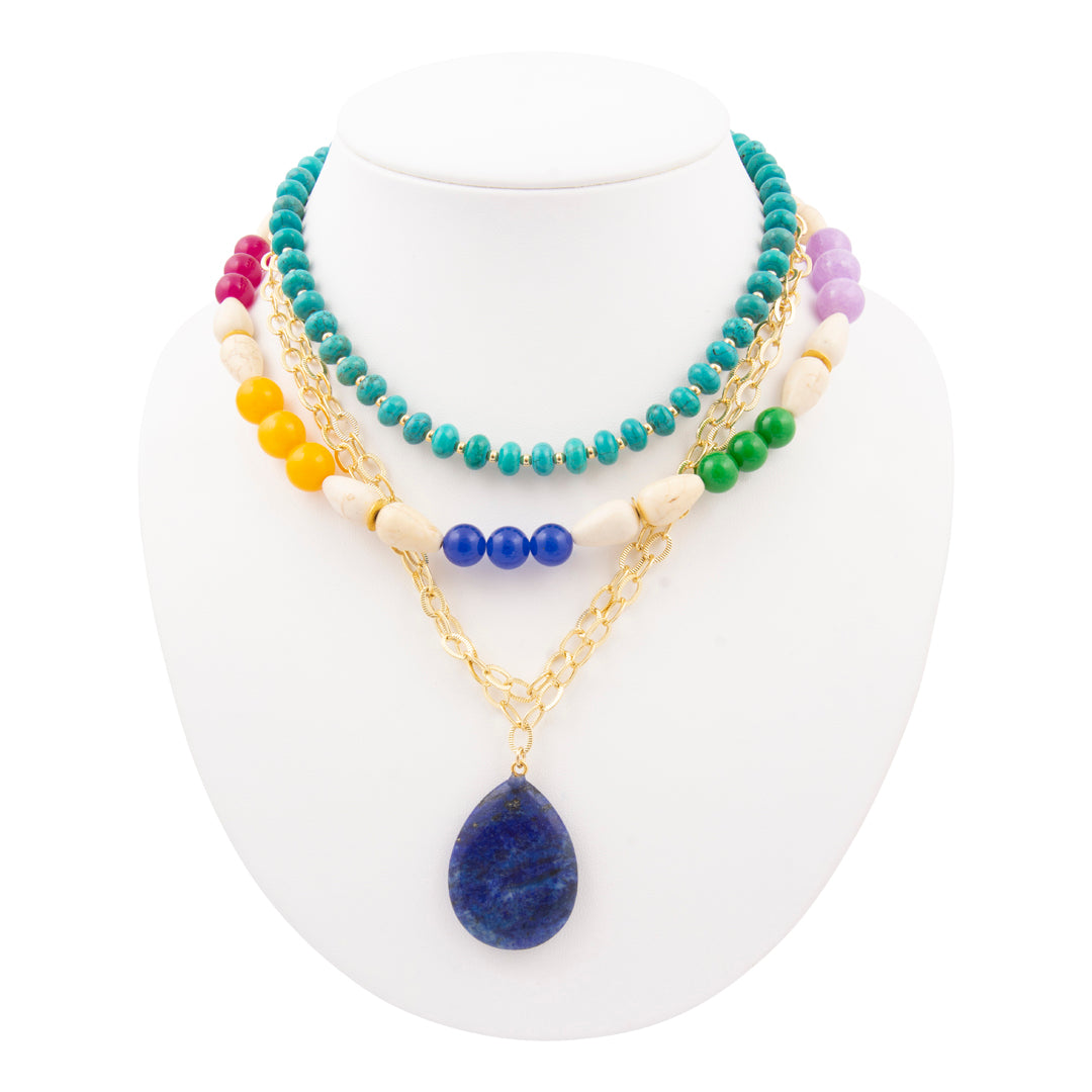 Colorful beaded necklaces on a white mannequin bust
