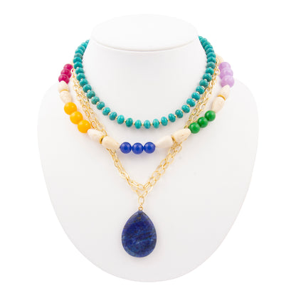 Colorful beaded necklaces on a white mannequin bust