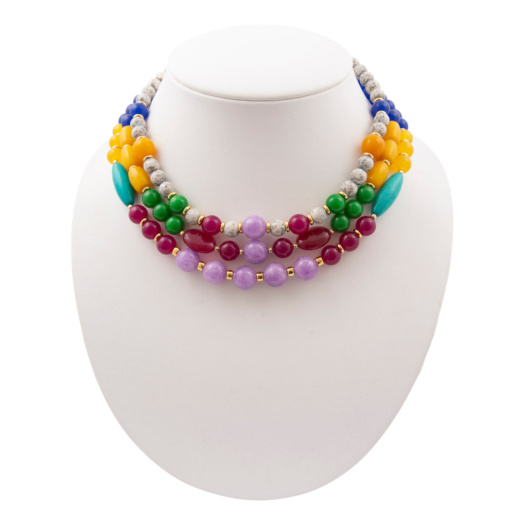 Colorful beaded necklace on a white mannequin bust