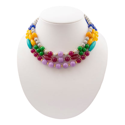 Colorful beaded necklace on a white mannequin bust