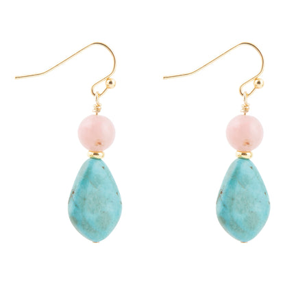 Pair of earrings with pink and blue stones on a white background