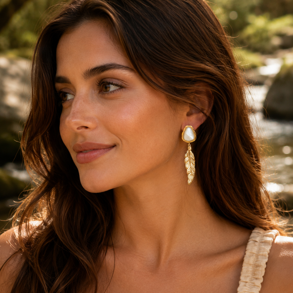 Woman wearing earrings with a natural background