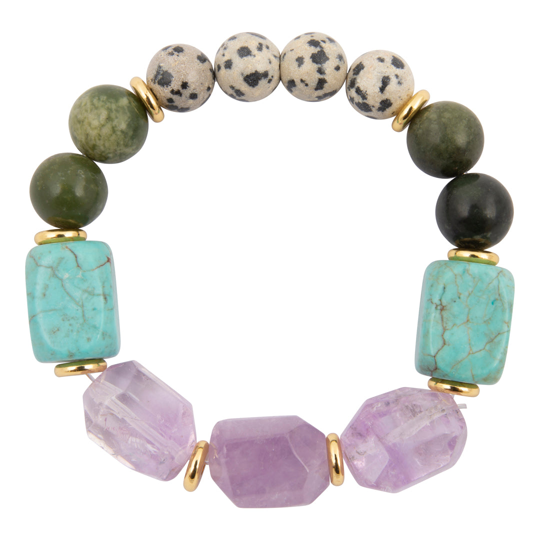 A beaded stretch bracelet featuring light blue turquoise rectangular beads, faceted purple amethyst beads, dark green and black round beads, and speckled beige and white dogtooth beads, separated by small gold spacer rings, on a solid white background.