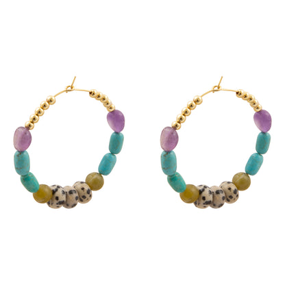 A pair of gold-tone hoop earrings featuring a multi-colored beaded design with purple amethyst, turquoise, olive green, and spotted agate beads, shown on a plain white background.